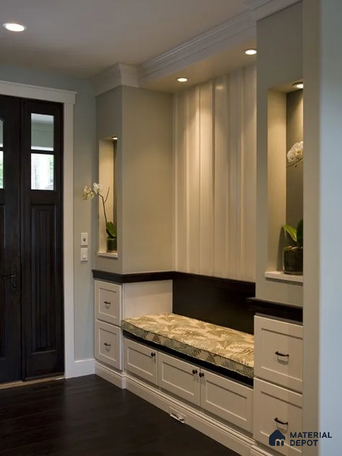 A kitchen with marble counter tops and stainless steel appliances on the wall, along with hanging lights hanging from the ceiling over the ceiling in front of a wooden counter top of a kitchen counter top space next to